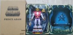 SUPER 7 MASTERS OF THE UNIVERSE CLASSICS PRINCE ADAM – 18 CM -Character Model prince adam logo 460